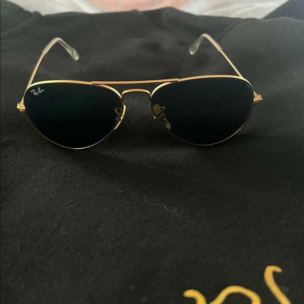 Blue and rose gold Ray Bans! Females